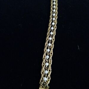 Elegant Gold and Pearl Chain Bracelet
